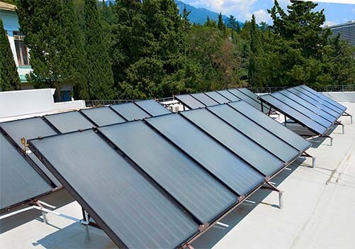 Large-scale solar water heater installations can significantly reduce energy costs for businesses